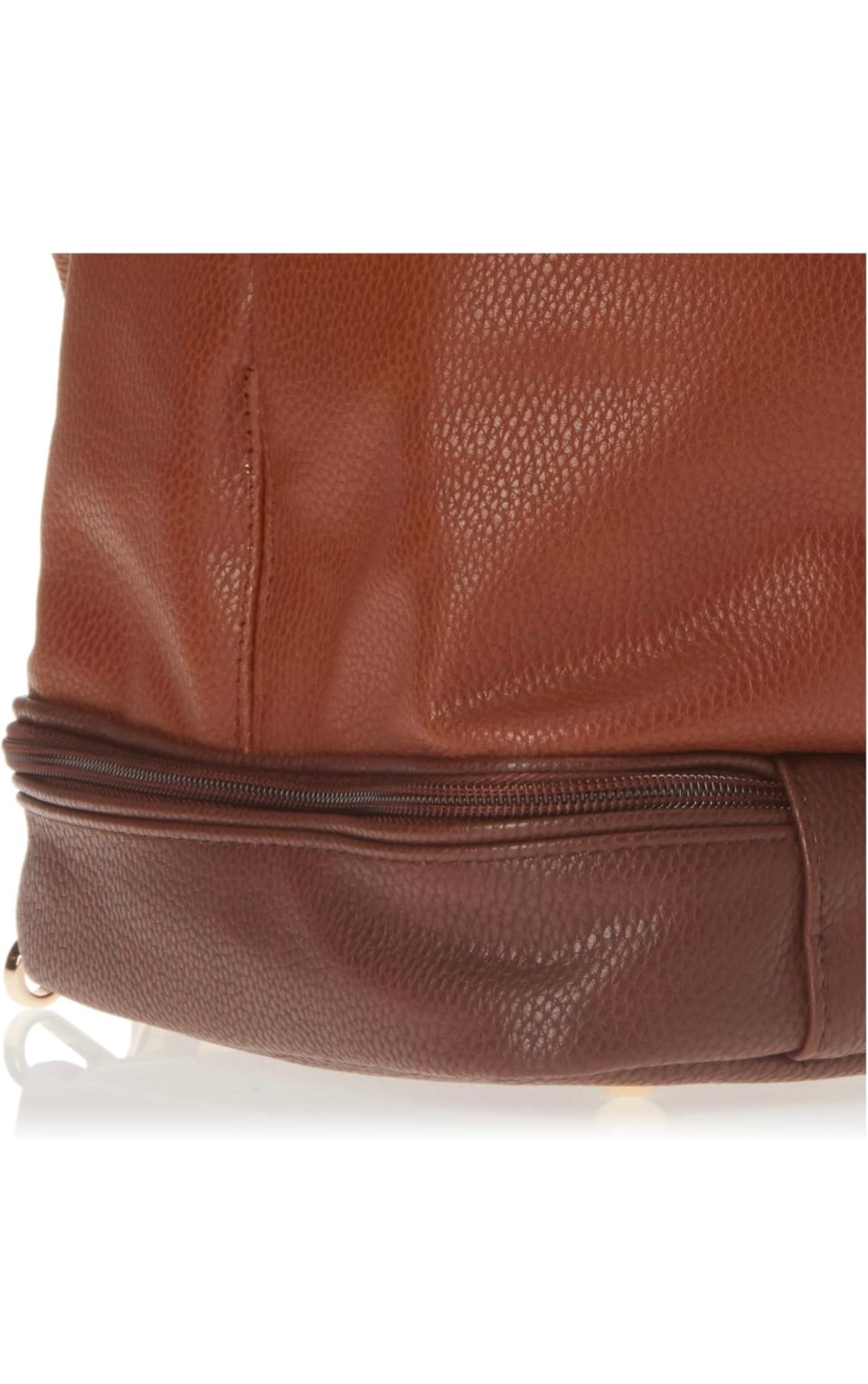 The SamLouise London 77 Tennis Tote from SamLouise is a chic sports tote bag in blue with white accents and a detachable strap. It includes a zippered bottom compartment, an insulated bottle holder, and a cylindrical pouch on the side.