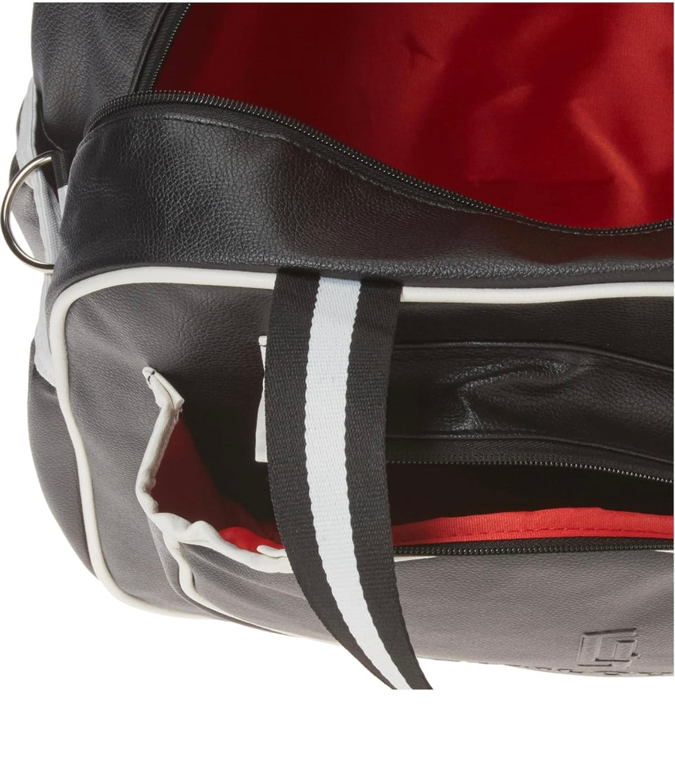 Introducing the SamLouise England 68 Pickleball Bag: a chic red bag crafted from eco-friendly vegan leather. It features zippered pockets and a shoulder strap adorned with white accents, all showcased against a pristine white background.